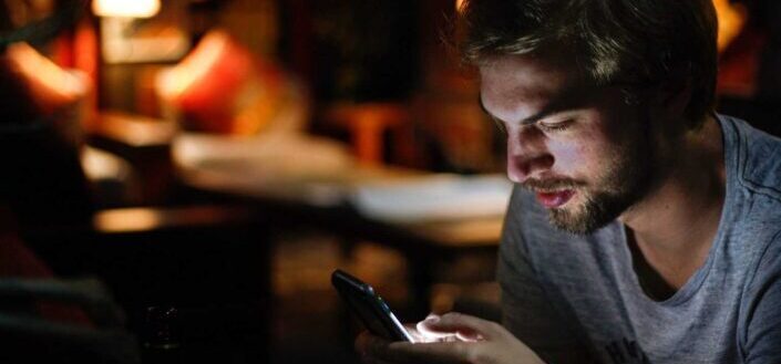 Man texting in the middle of the night.
