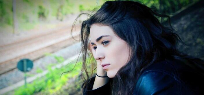 Woman looking away and thinking