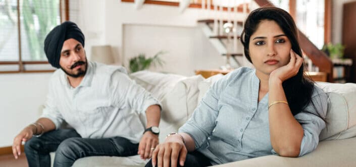 Woman looking away from her man