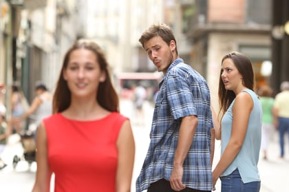 Red flags in a guy with his girlfriend while looking at another girl.