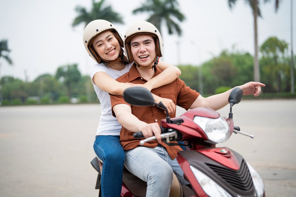 Fun second date idea: couple riding a scooter together