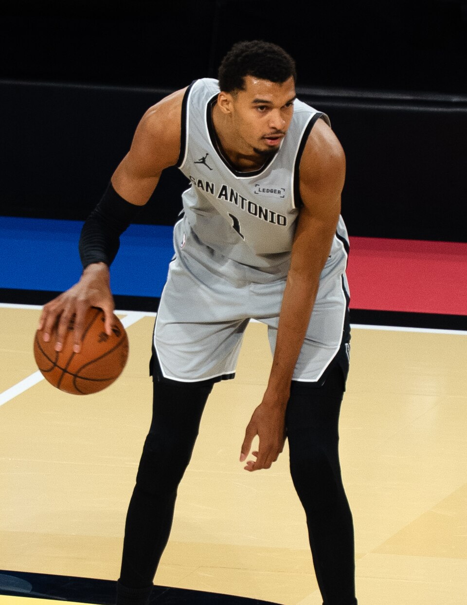Victor Wembanyama dribbles the ball in the 2026 NBA playoffs.