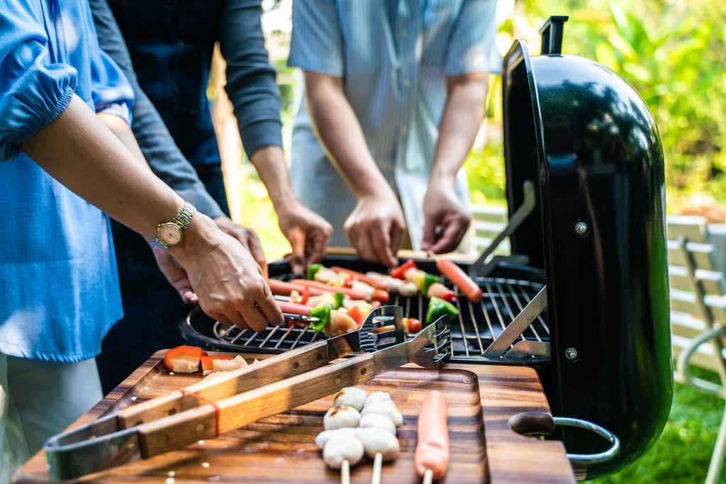men grilling at a cookout