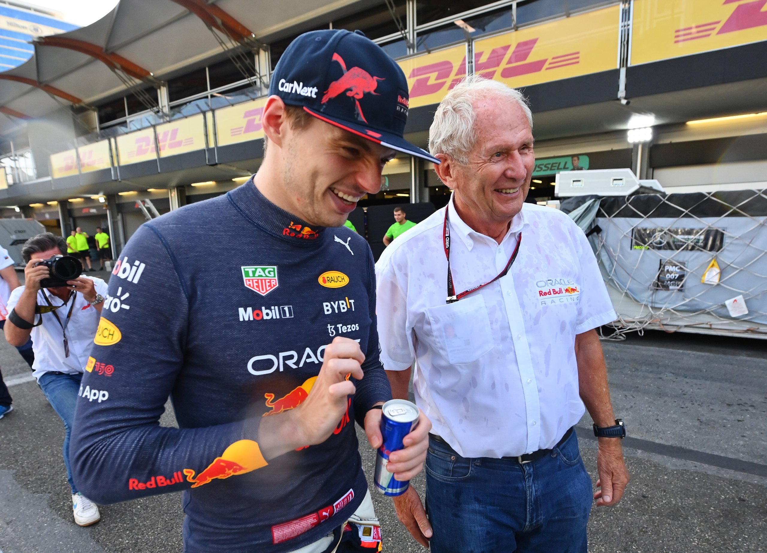 Race winner Max Verstappen of the Netherlands and Oracle Red Bull Racing and Red Bull Racing Team Consultant Dr Helmut Marko talk after the F1 Grand Prix of Azerbaijan at Baku City.