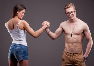 A man and woman posing together to represent global male vs female substance use trends.
