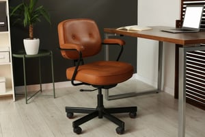 Modern ergonomic office chair placed in a stylish home workspace.